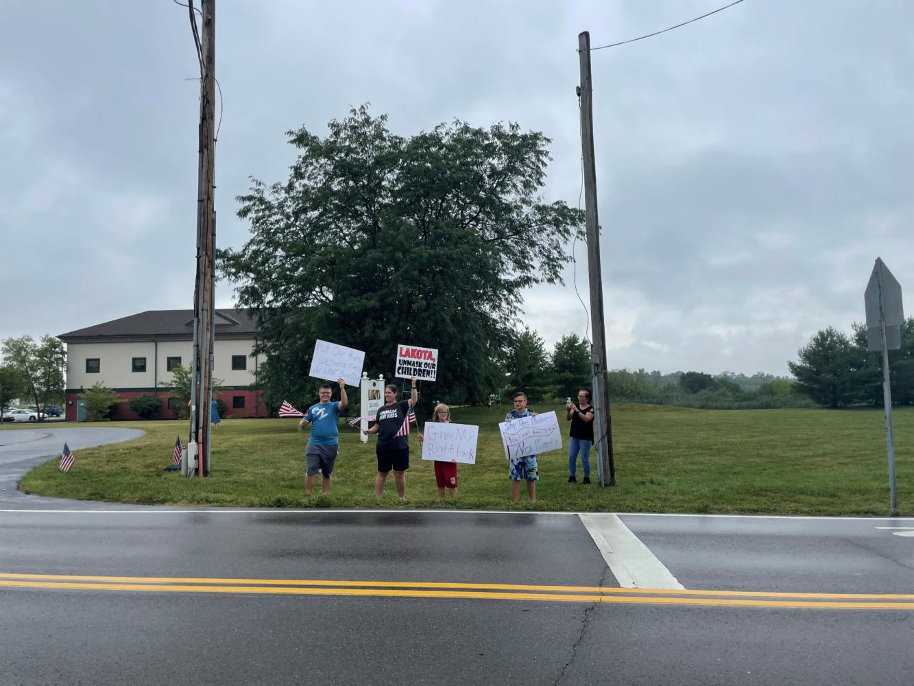 This Tues. Aug. 17, Lakota families gathered outside Lakota Local School District Offices to protest the recent announcement that students and staff are required to wear masks while in school for the upcoming school year. 
