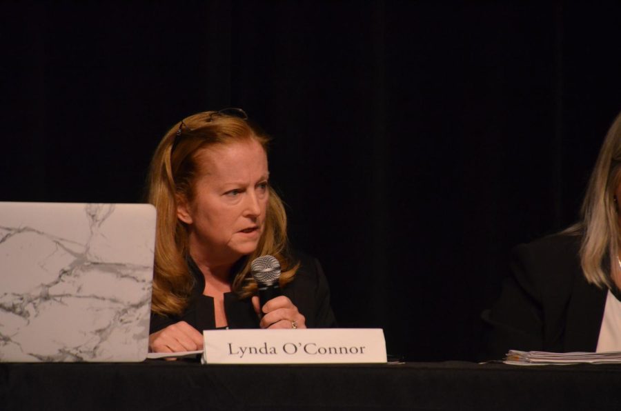 School Board Member Lynda OConnor speaks at the Spark Candidate Night in 2019. 