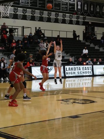 East senior Sarah Sewak takes a shot during the East v. Princeton game. 