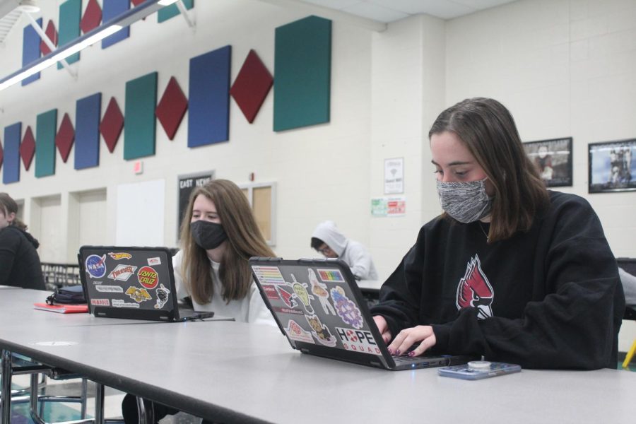 East seniors Olivia Marshall and Maddie Cramer work during the extended study hall that students have on block days.
