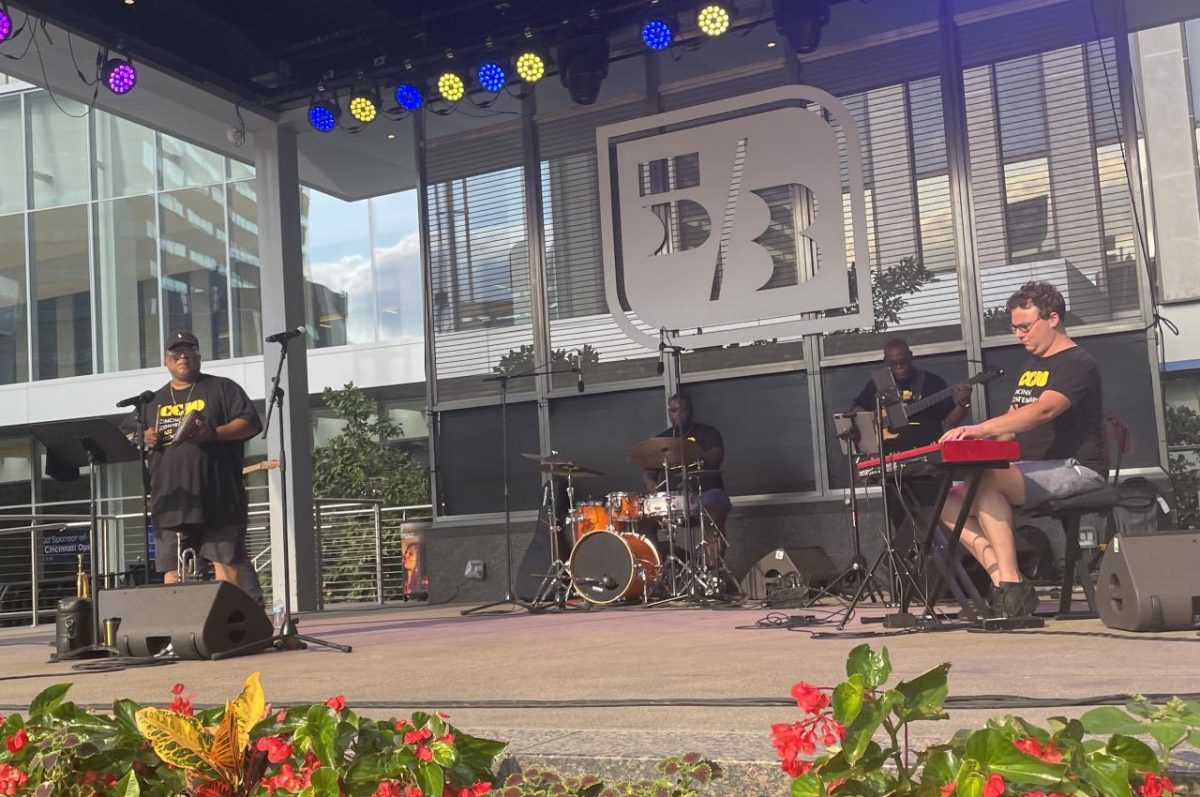 Mike Wade sets his trumpet aside for a cowbell. Wade led his quintet in playing classic Miles Davis compositions on July 30.