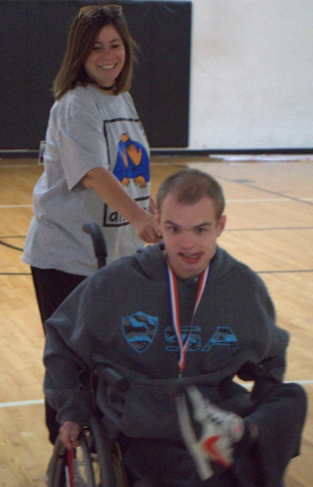 Bowmann dances with student at her weekly, Thursday dance party.