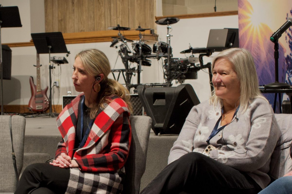 From left to right, Superintendent Dr. Ashley Whitely and board president Julie Shaffer listen to Arabic speaking parents at the January 29, Community Conversation.