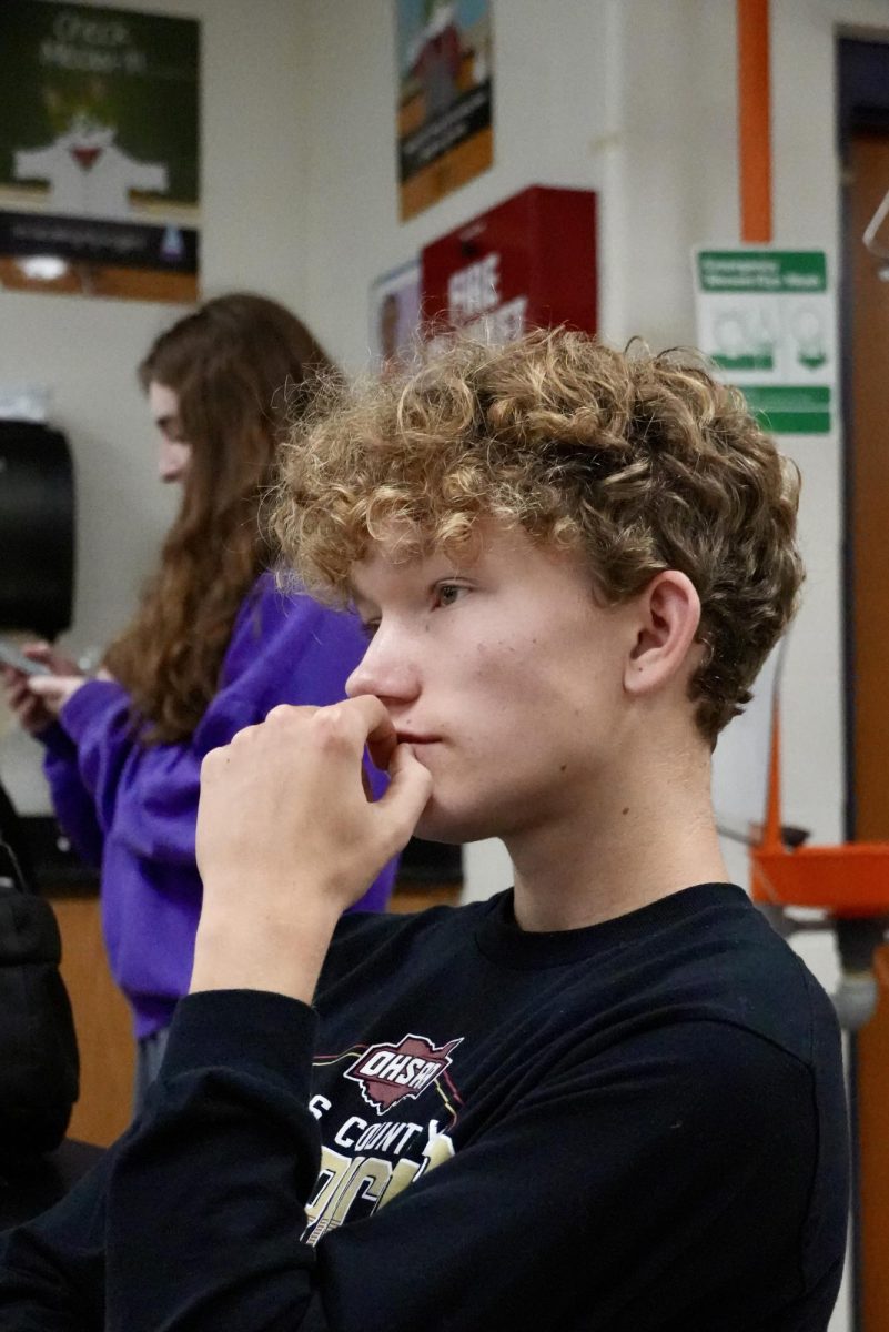 Senior Academic Quiz Team (AQT) member Luke Huggins ponders a question. Lakota East AQT began their season with a practice on Friday, November 22, 2024.